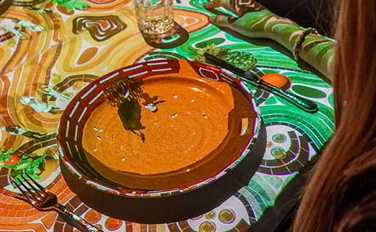 Dish on table with projection